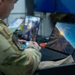 U.S. Air Force Staff Sgt. Yuya Dorgan maneuvers a drone in a virtually simulated environment during the Joint Multi-Domain Counter Unmanned Aircraft Systems Operator Course in the Grafenwoehr Training Area, Germany, Feb. 13, 2026. The Joint Multi-Domain Counter Unmanned Aircraft Systems Operator Course is a course designed to turn warfighters into subject matter experts in counter-UAS tactics who return to their units as force multipliers in countering the UAS threat. (U.S. Army photo by Staff Sgt. Jamie Robinson)